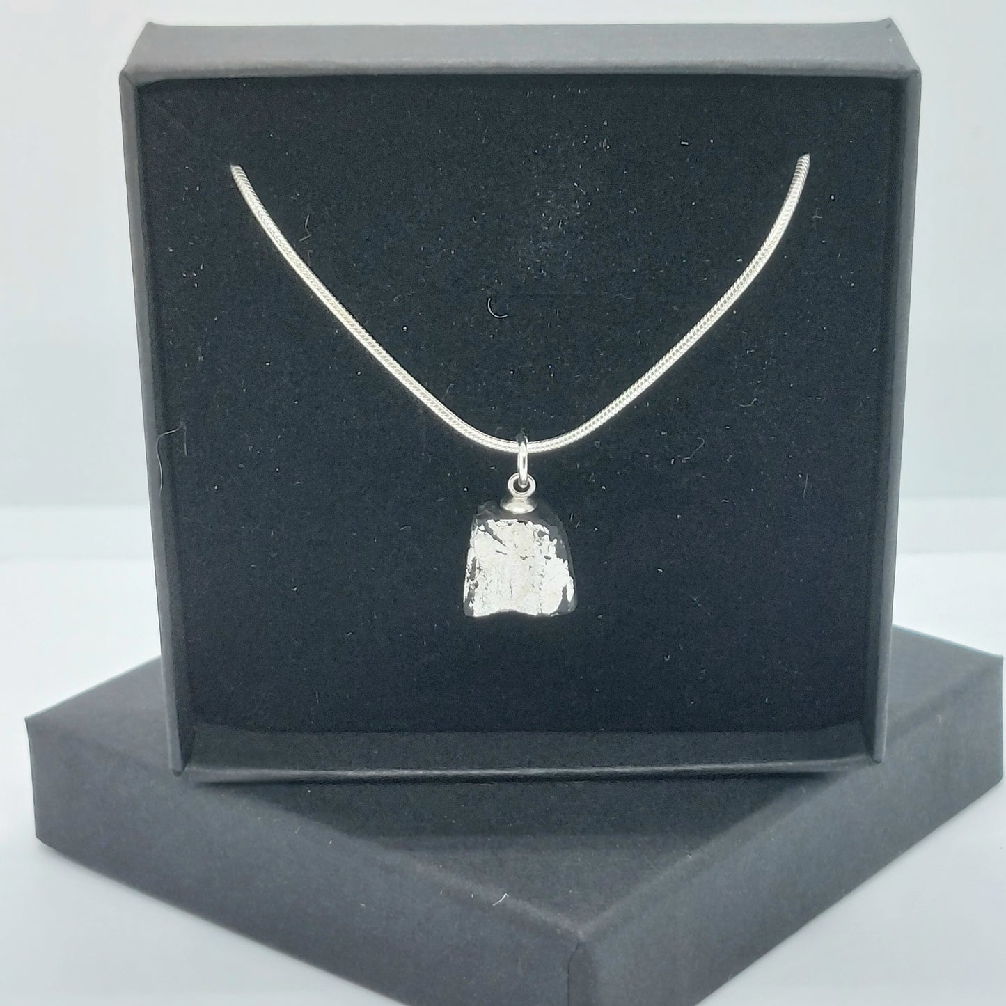 Aoife - Irish bog oak with fine silver leaf and sterling silver chain