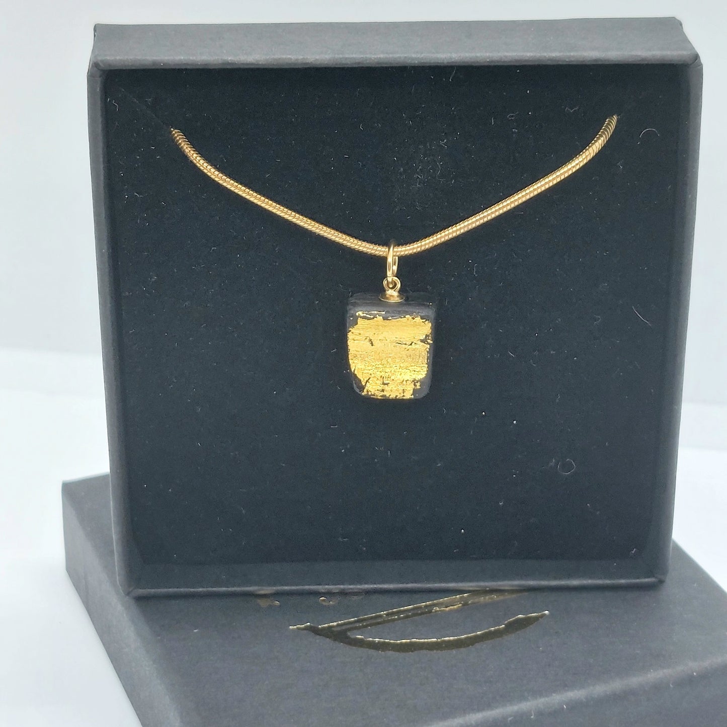 Aoibheann - Irish bog oak necklace with 23.75ct gold leaf