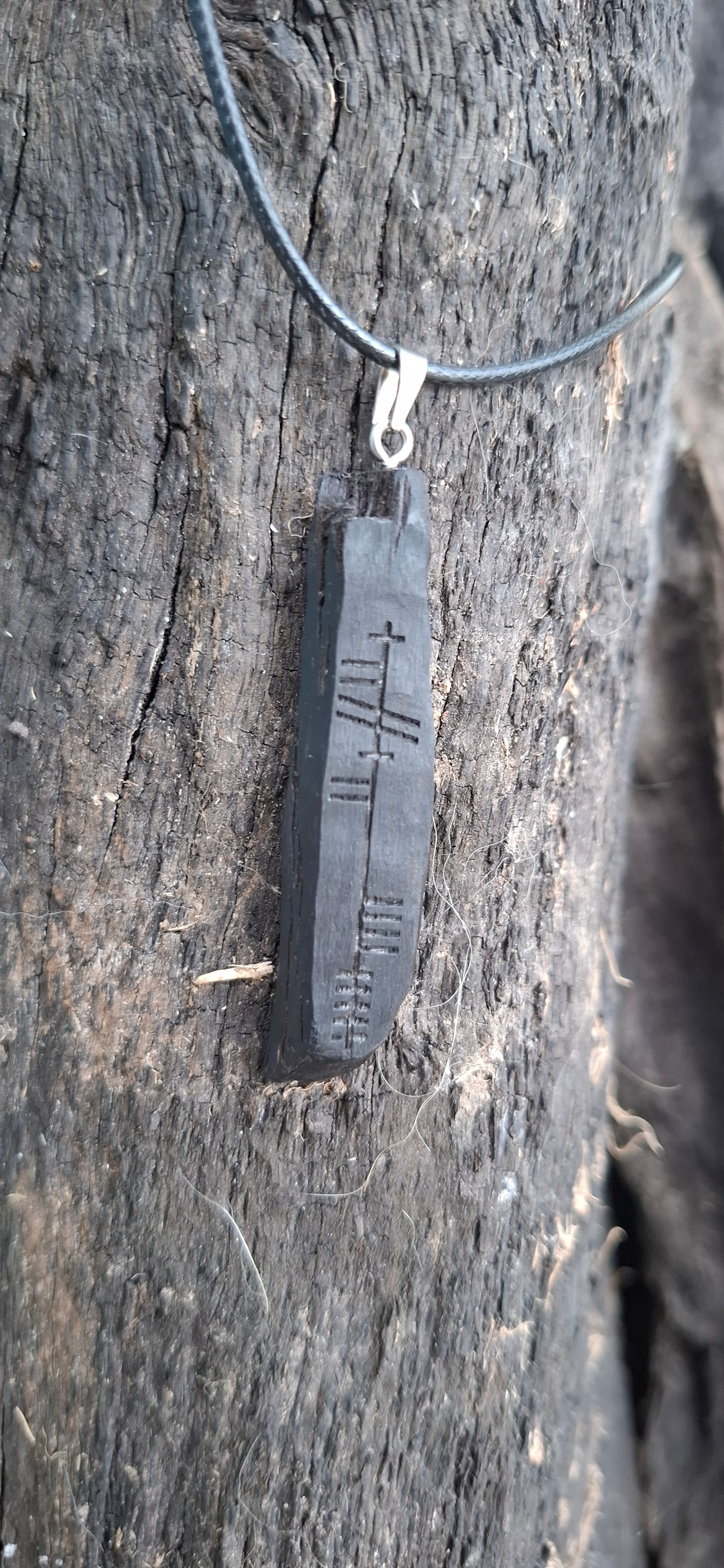 Bog oak wooden pendant with custom Ogham inscription