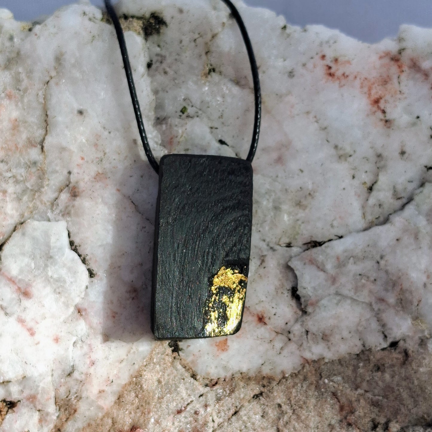 Cadhla II - Irish bog oak necklace with 23.75ct gold leaf