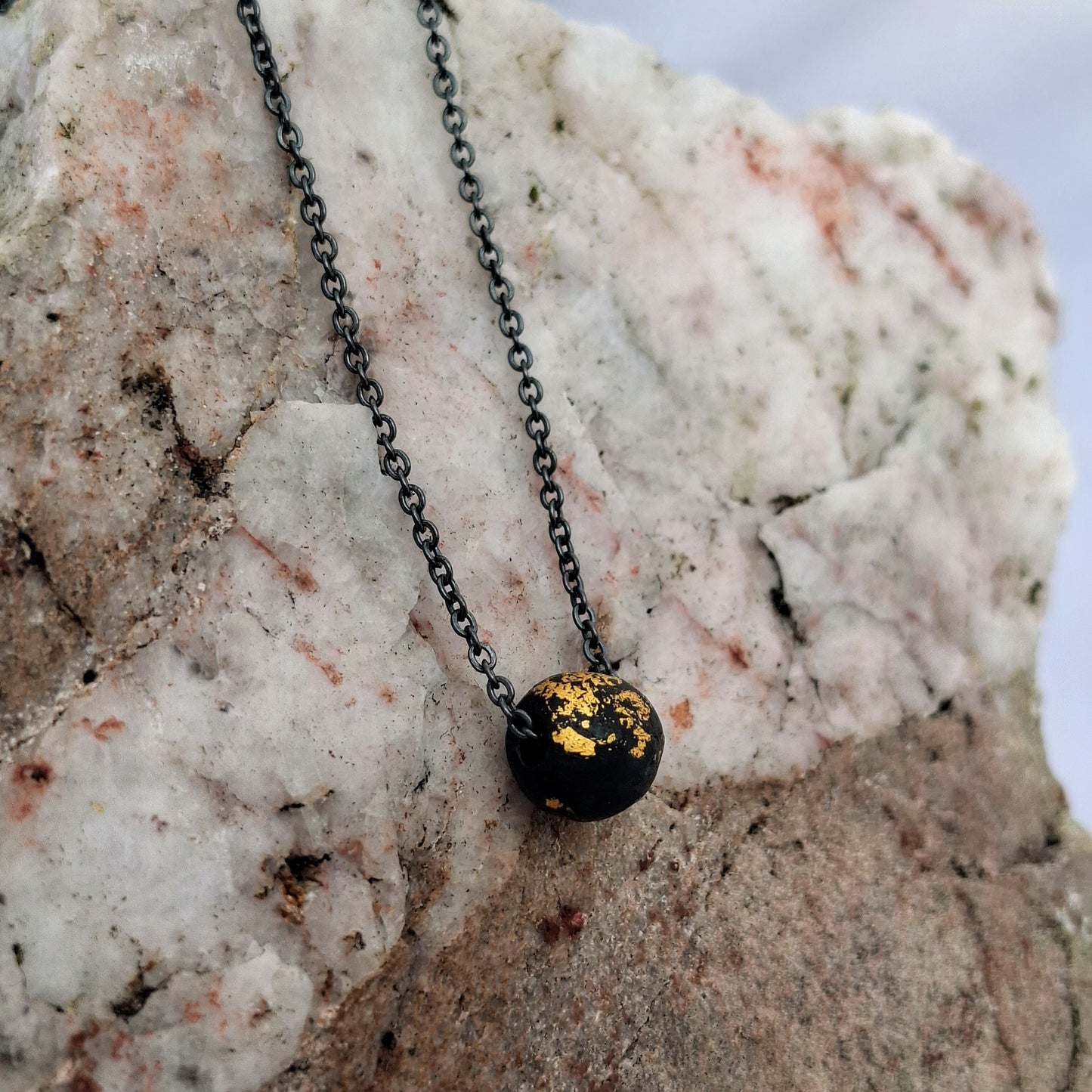 Saol - Irish bog oak necklace with 23.75ct gold leaf