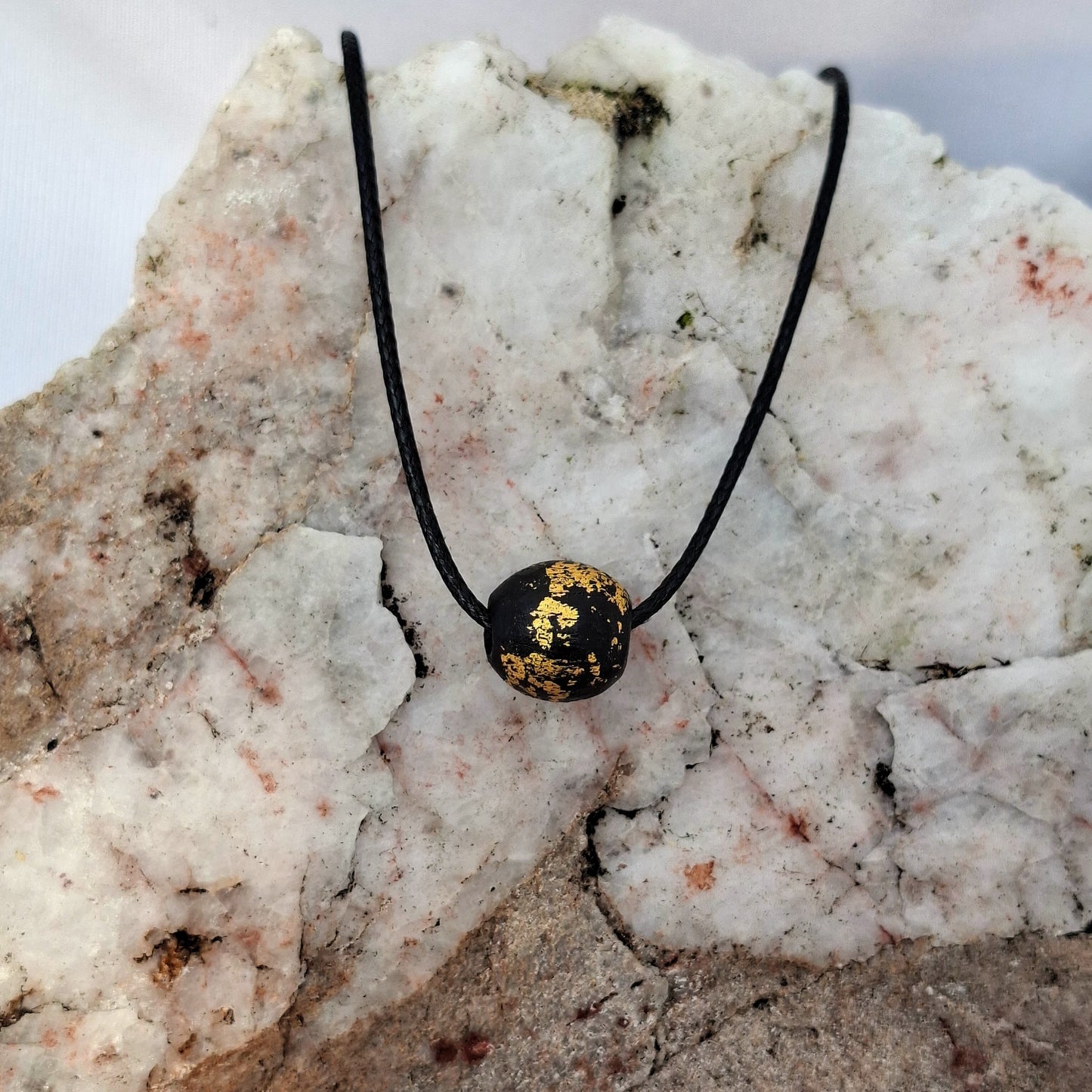 Saol - Irish bog oak necklace with 23.75ct gold leaf