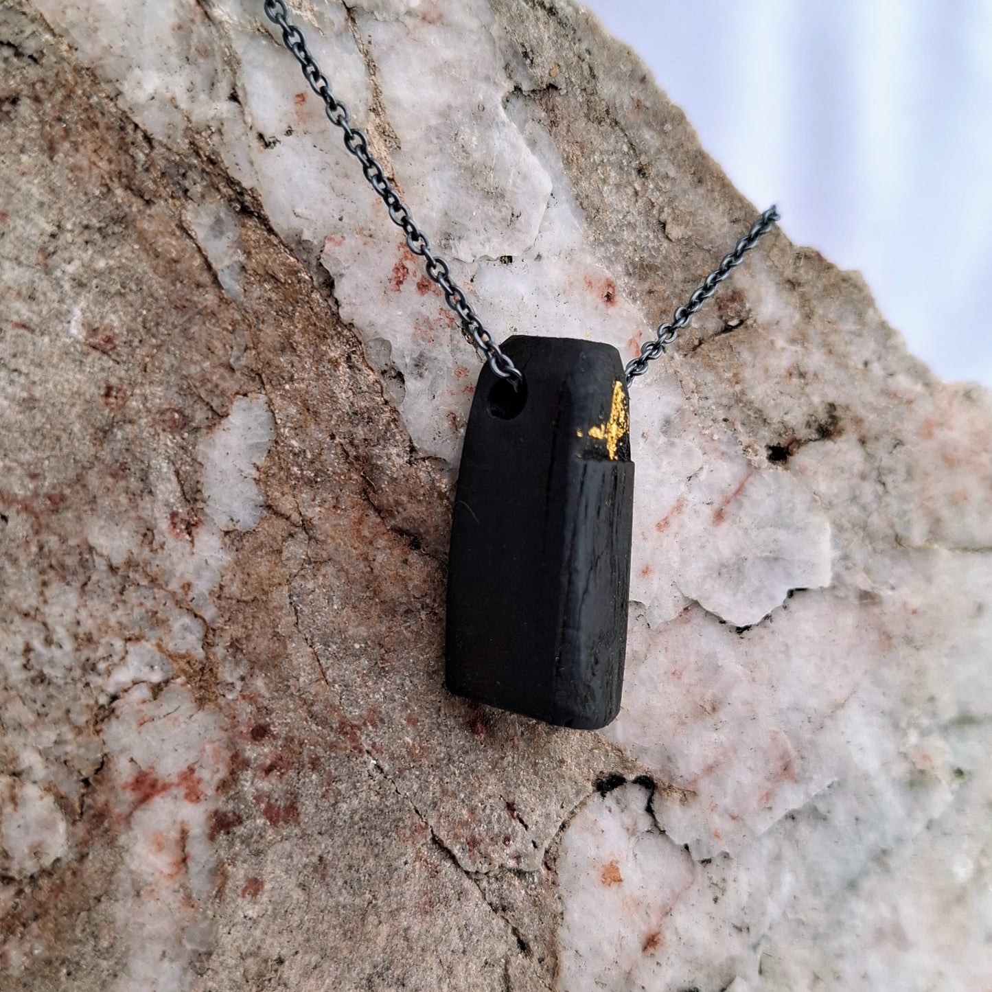 Réalta - Irish bog oak necklace with 23.75ct gold leaf