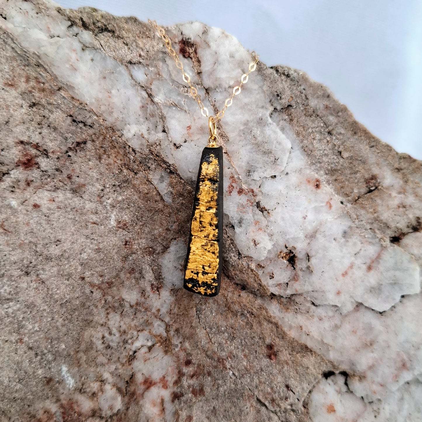 Siún - Irish bog oak necklace and earrings with 23.75ct gold leaf