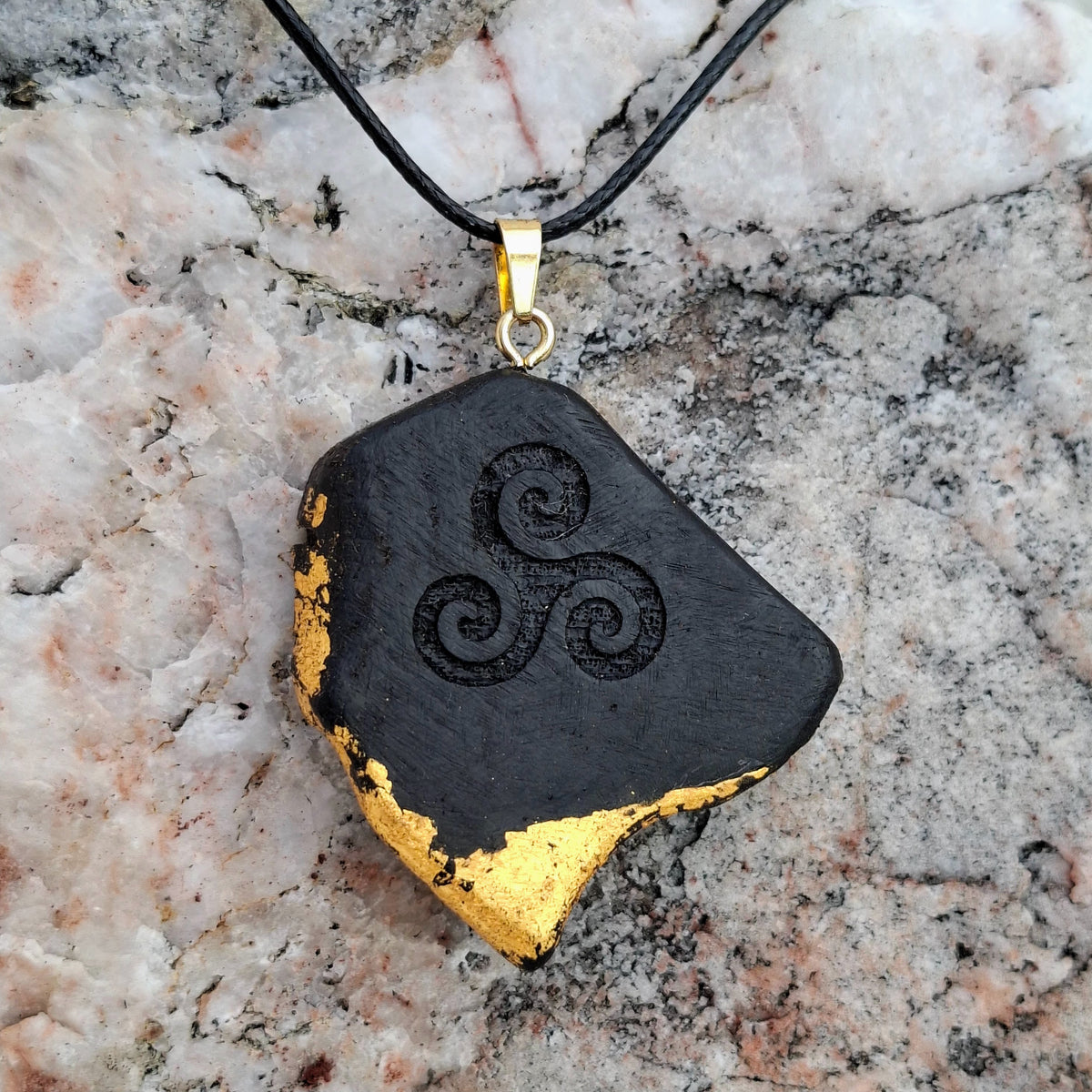Bog oak wooden pendant with triskelion symbol