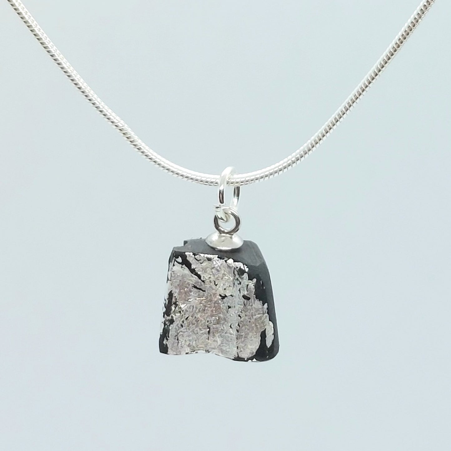 Aoife - Irish bog oak with fine silver leaf and sterling silver chain