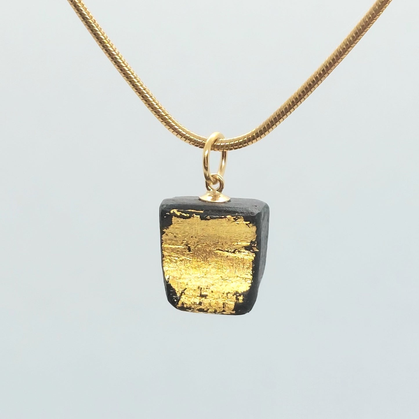Aoibheann  - Irish bog oak necklace with 23.75ct gold leaf