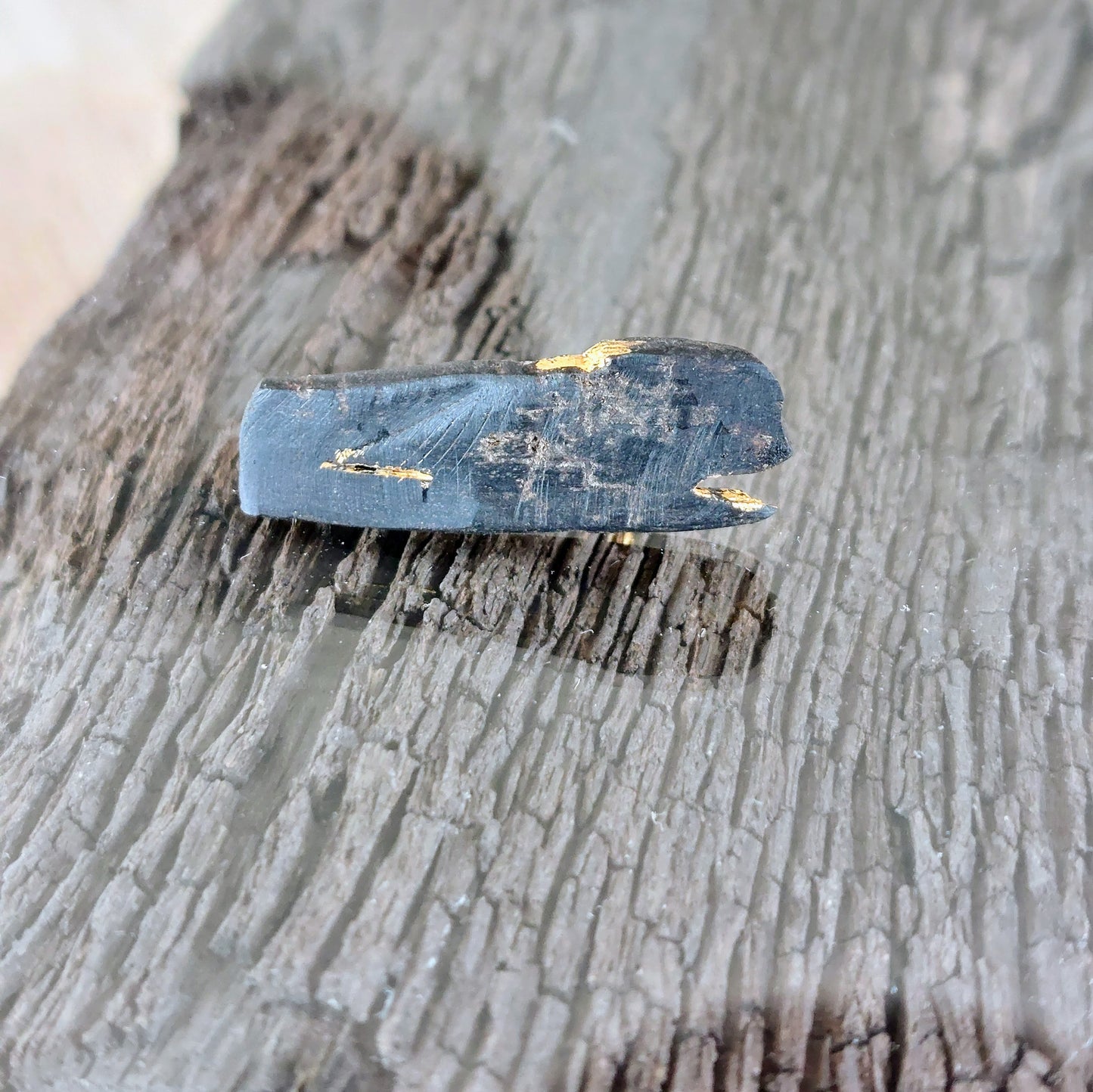 Riley - Irish bog oak brooch with 23.75ct gold leaf