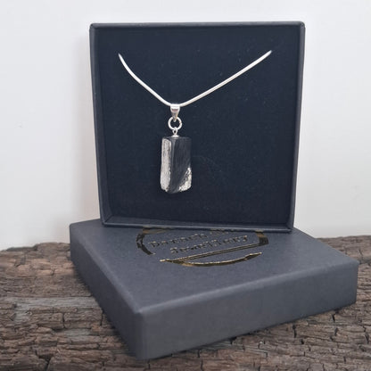 Fionnuala - Irish bog oak with fine silver leaf and sterling silver chain