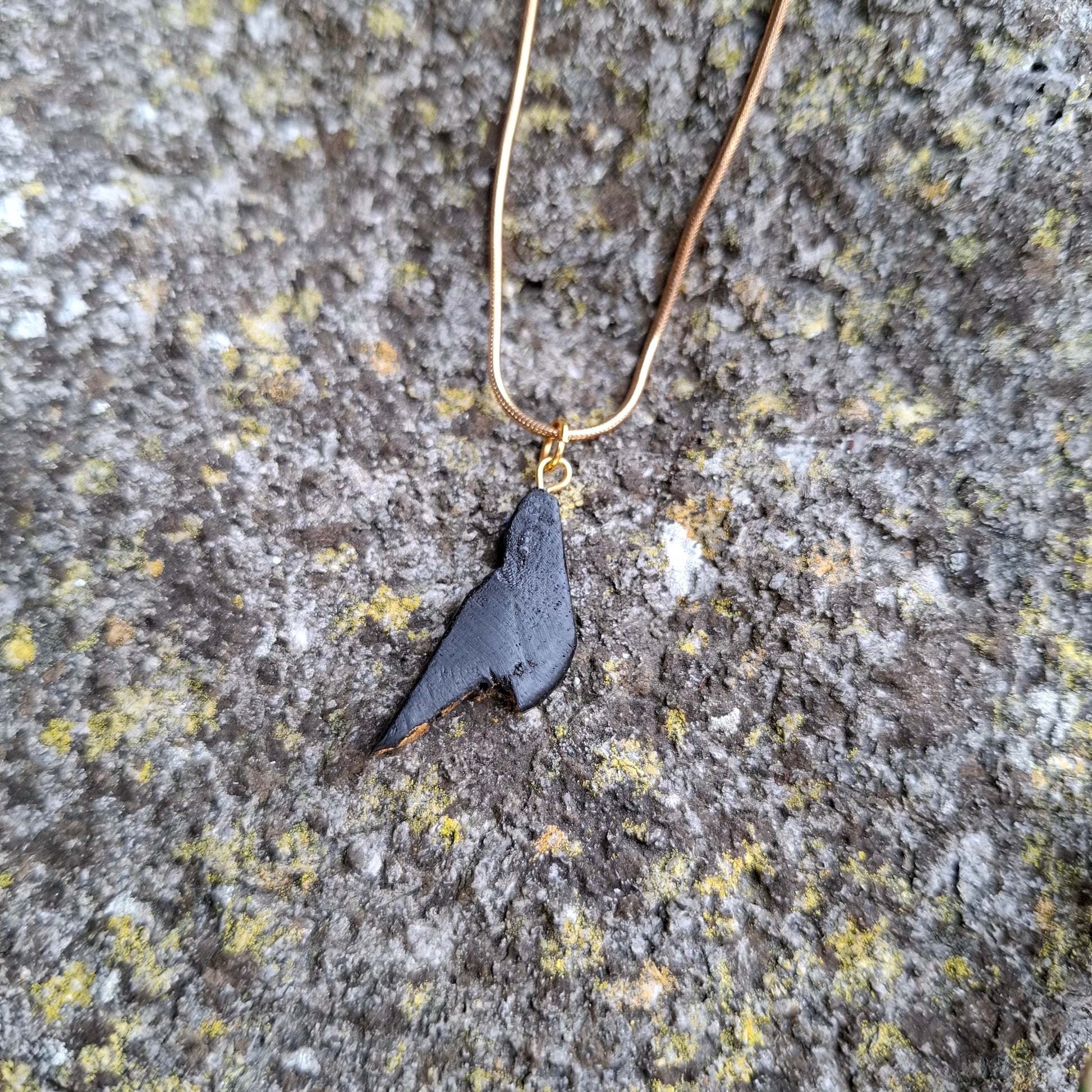 Pendant made out of irish bog oak finished with gold or silver leaf and necklace
