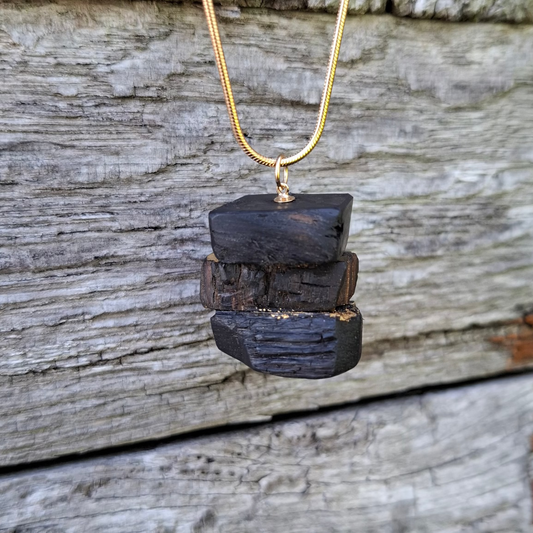 Turf Footin II - Irish bog oak necklace with 23.75ct gold leaf