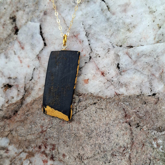 Treasa - Irish bog oak necklace with 23.75ct gold leaf