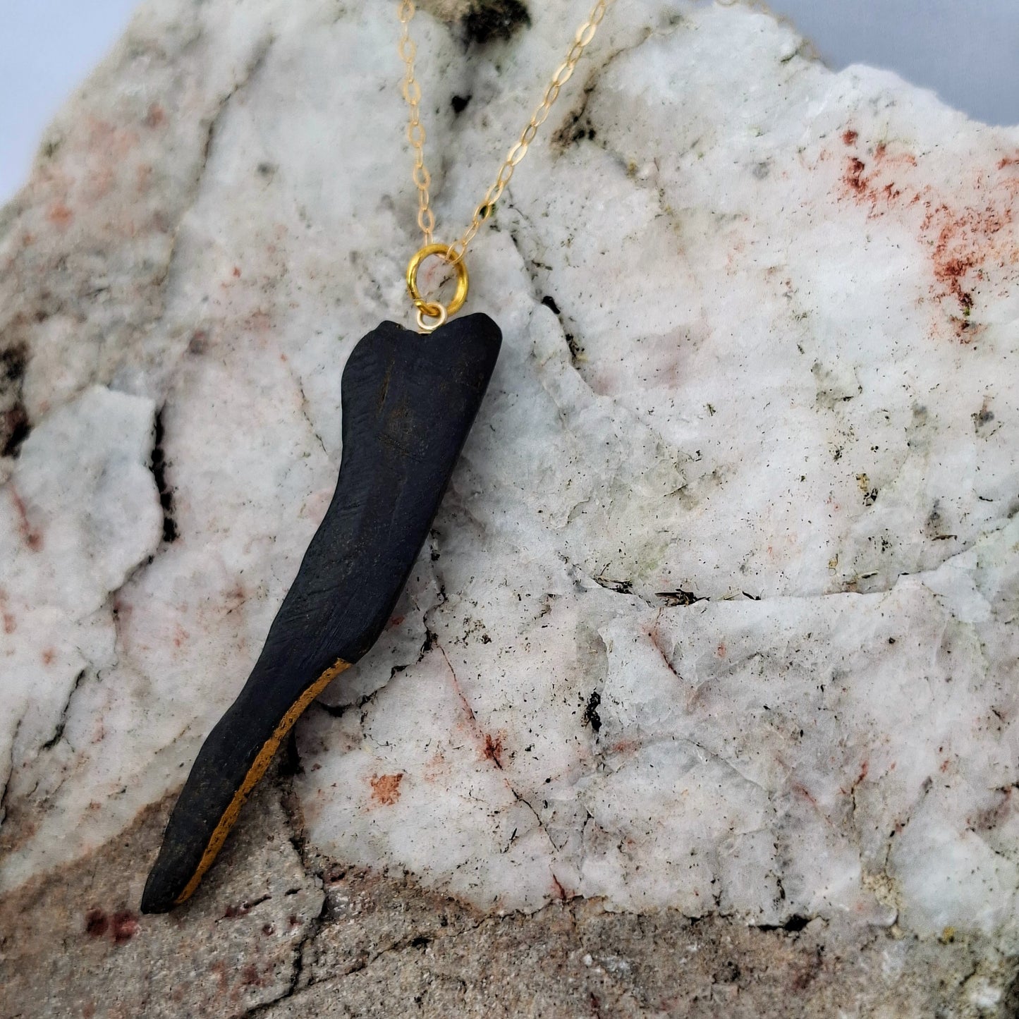 Méar Cailleach II- Irish bog oak necklace with 23.75ct gold leaf