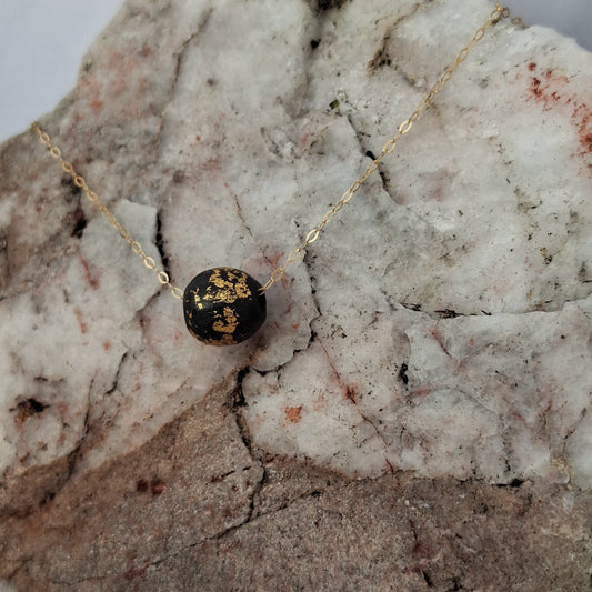 Saol - Irish bog oak necklace with 23.75ct gold leaf