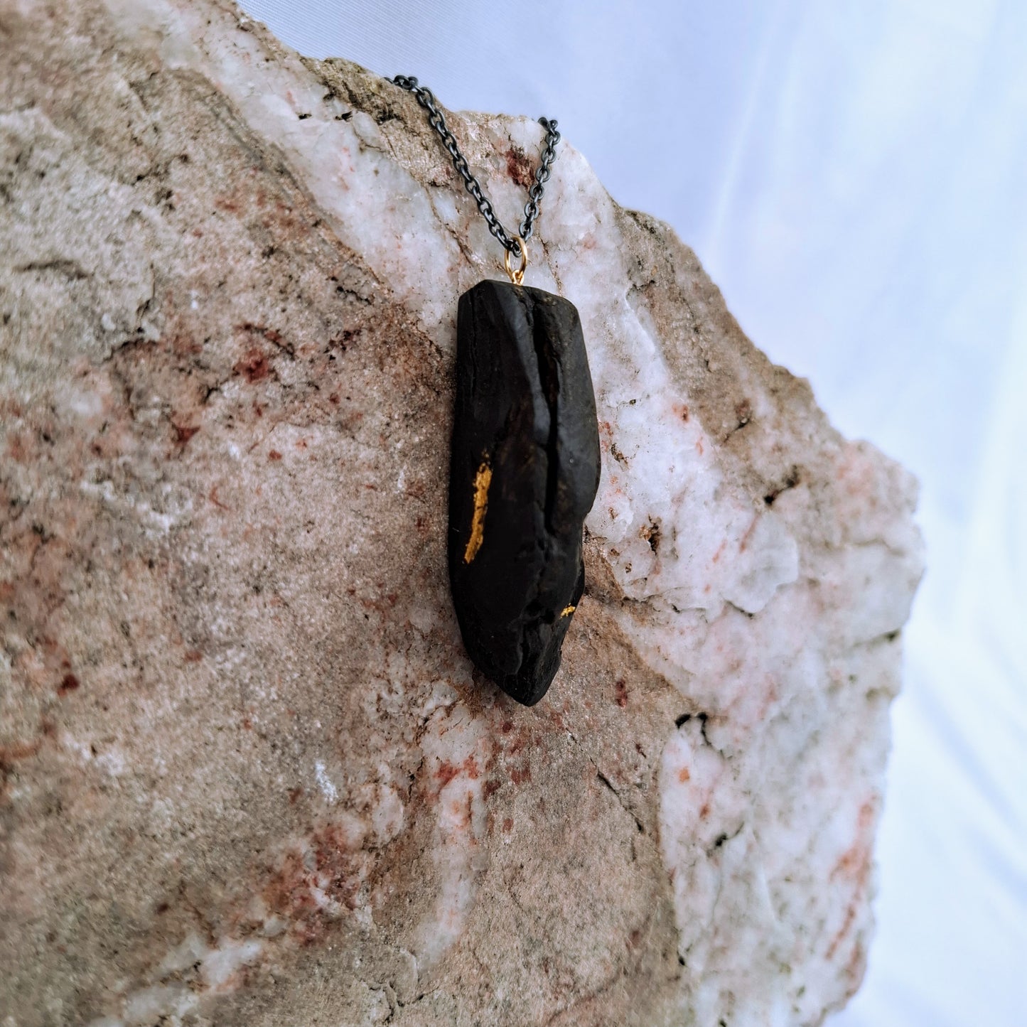 Aithne II - Irish bog oak necklace with 23.75ct gold leaf
