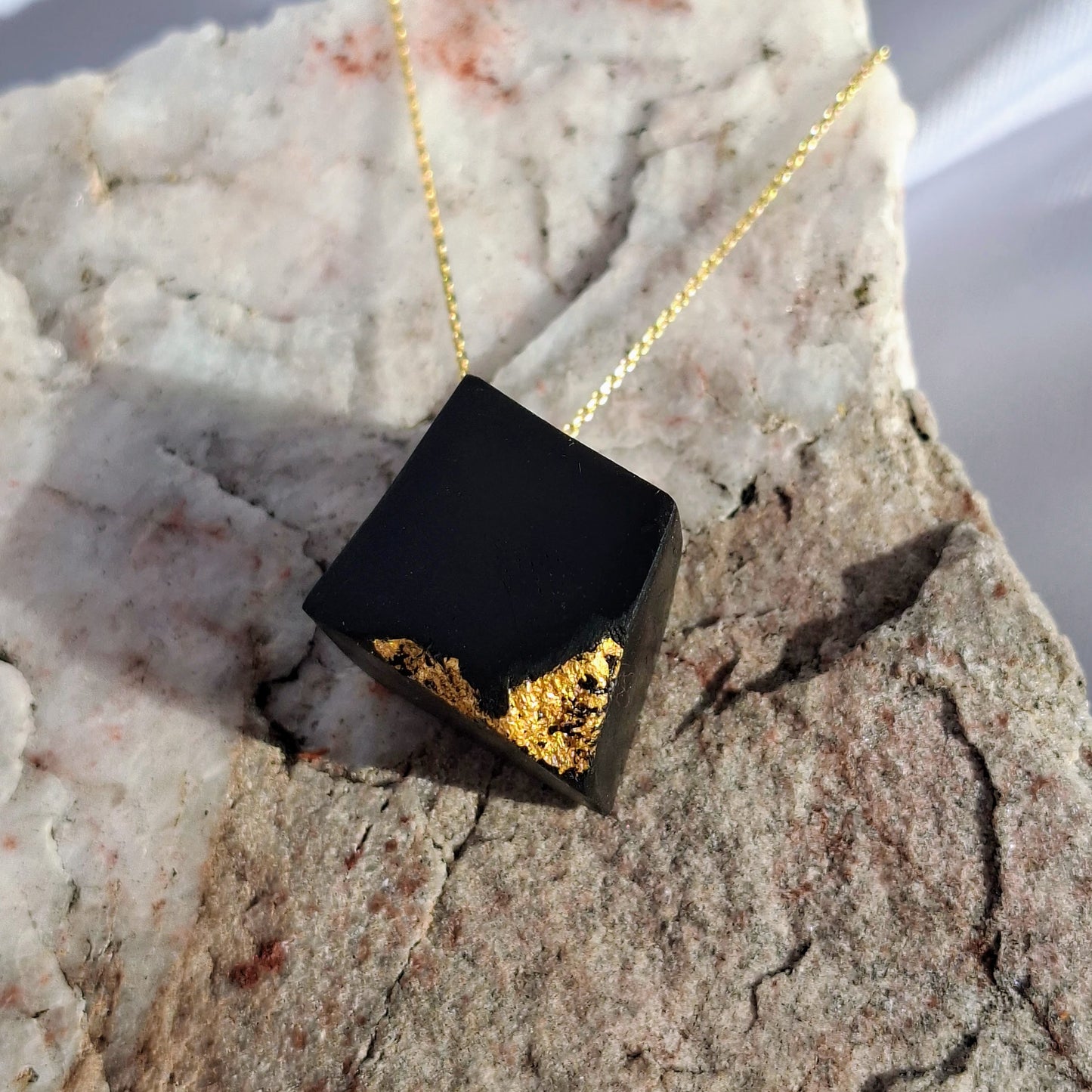 Scáil Óir - Irish bog oak pendant with 23.75kt gold leaf