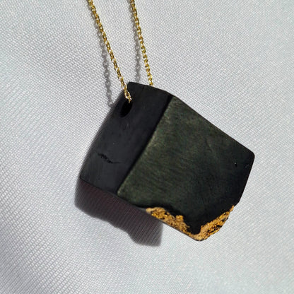 Scáil Óir - Irish bog oak pendant with 23.75kt gold leaf