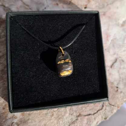 Cnapán - Irish bog oak pendant with 23.75kt gold leaf