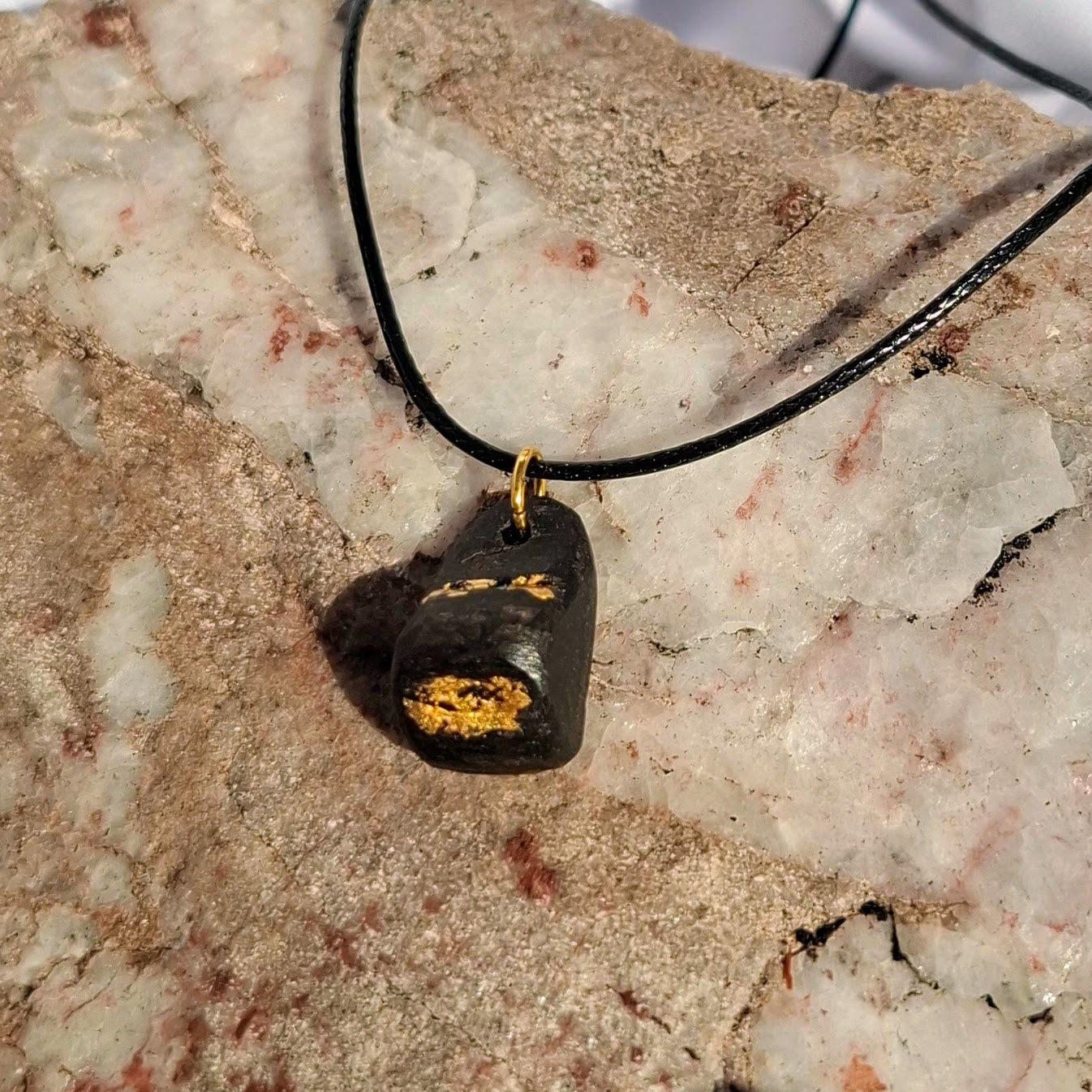 Cnapán - Irish bog oak pendant with 23.75kt gold leaf