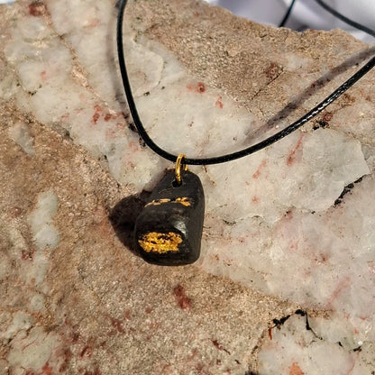 Cnapán - Irish bog oak pendant with 23.75kt gold leaf
