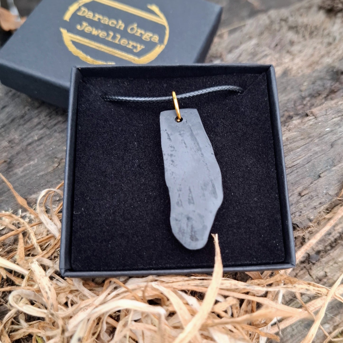 Bog oak wooden pendant with personalised custom Ogham inscription