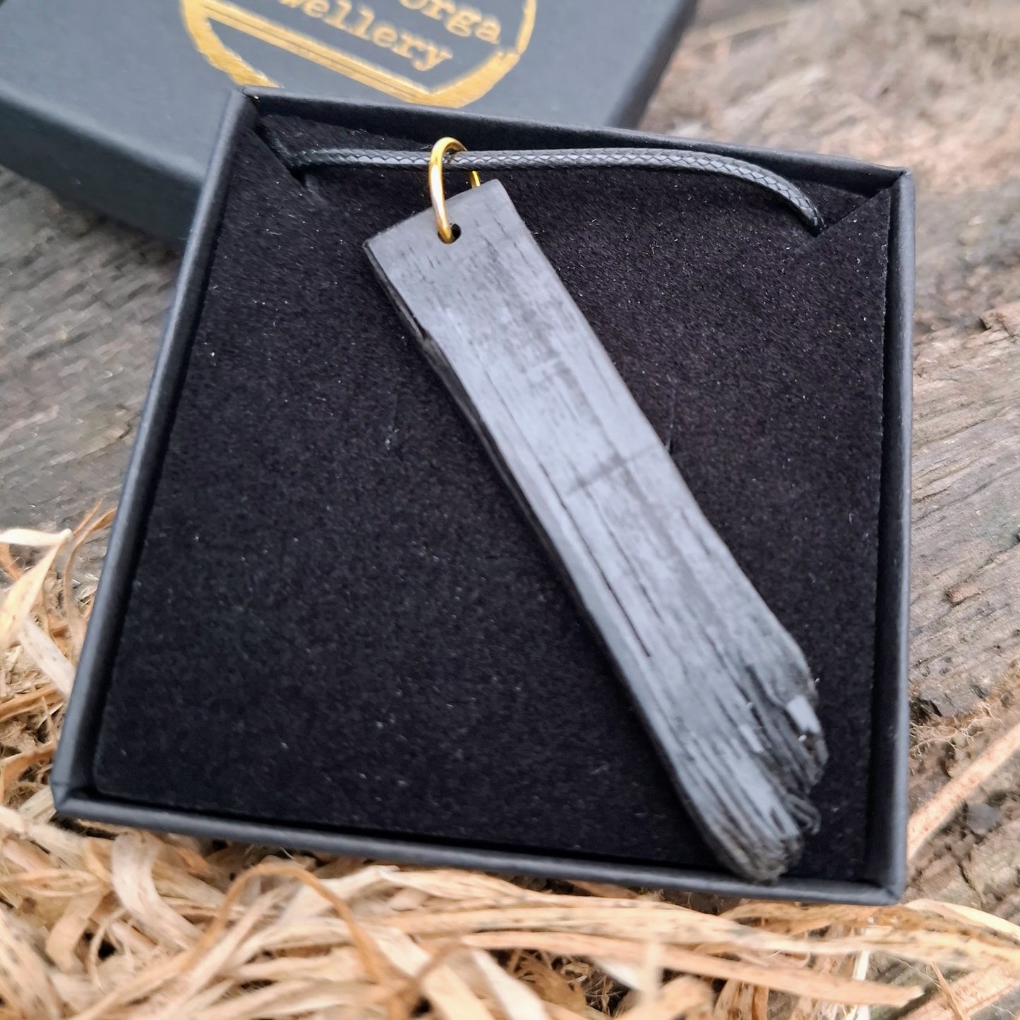 Bog oak wooden pendant with personalised custom Ogham inscription