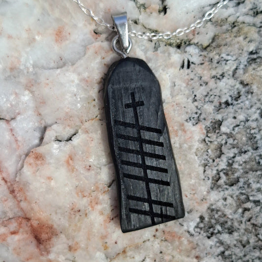 Bog oak wooden pendant with Grá (love) Ogham inscription