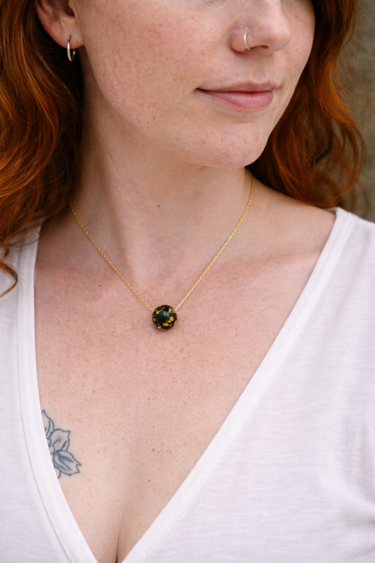 Cruinne - Irish bog oak pendant with 23.75kt gold leaf