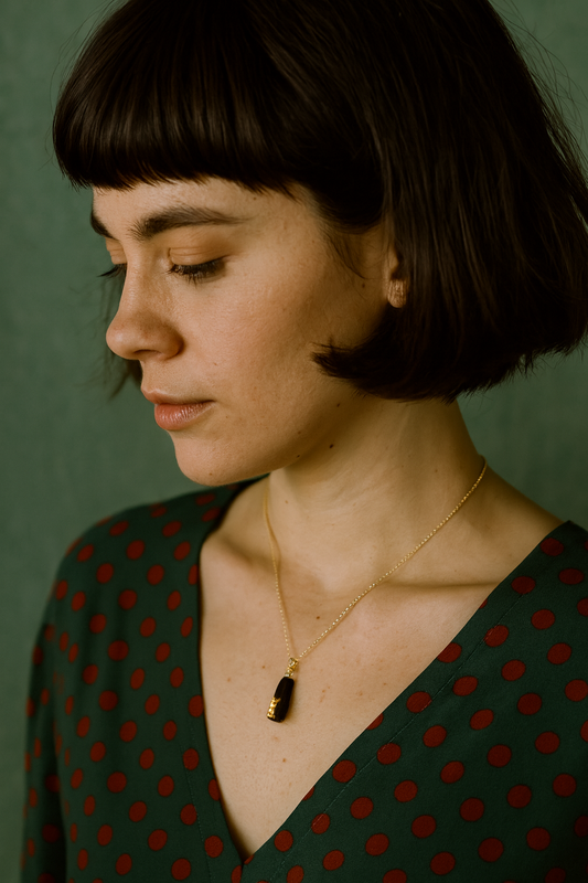 Mionda- Irish bog oak necklace with 23.75ct gold leaf