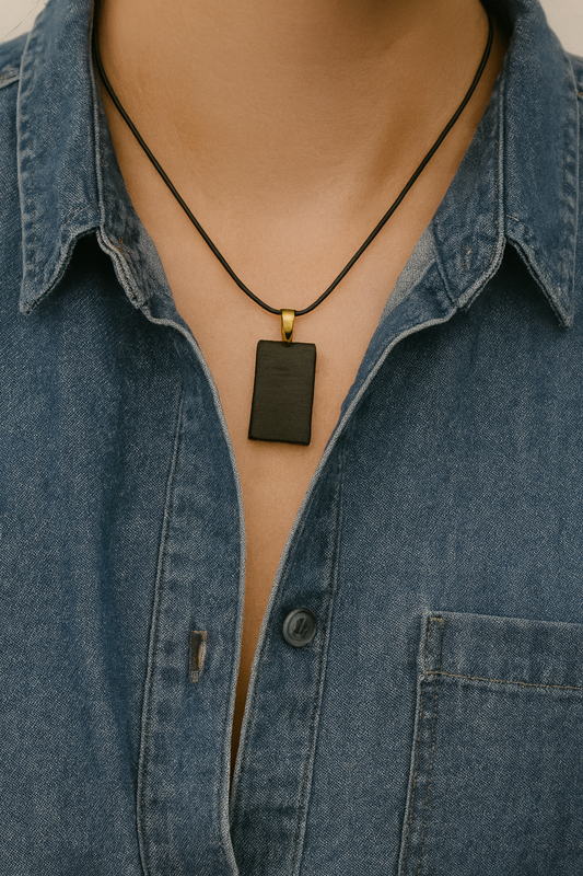 Irish bog oak pendant - can be customised with Ogham writing.