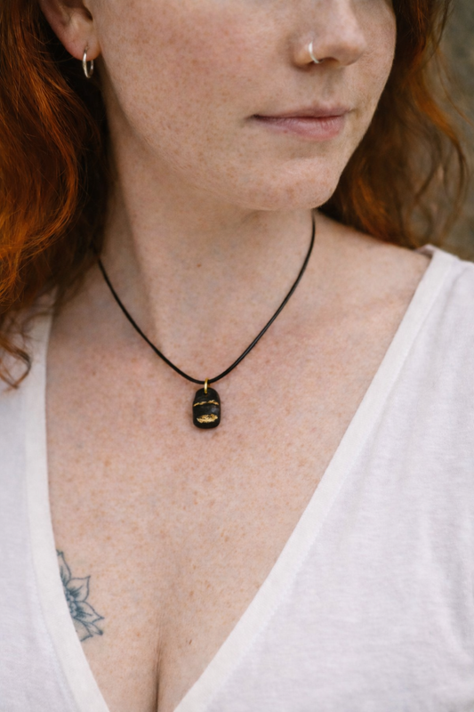 Cnapán - Irish bog oak pendant with 23.75kt gold leaf