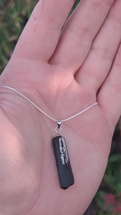 Pendant made out of irish bog oak finished with gold or silver leaf and necklace