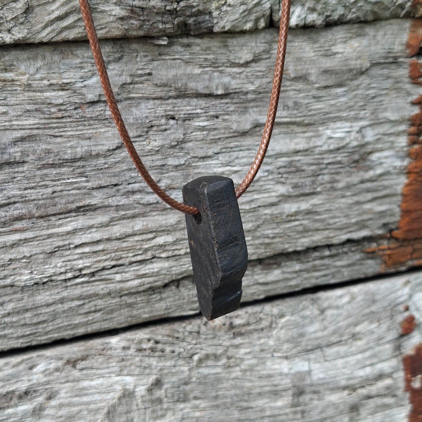 Portach  - Various Irish bog oak pendants with cord necklace