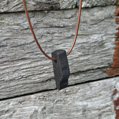 Portach  - Various Irish bog oak pendants with cord necklace