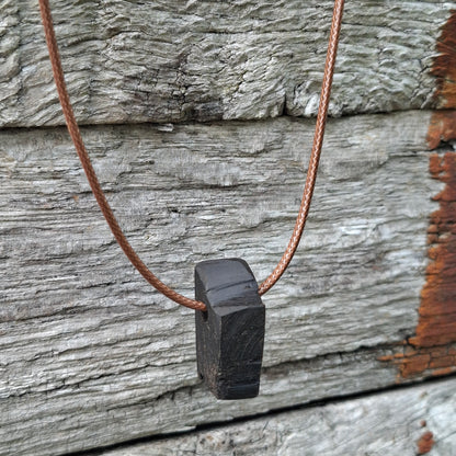 Portach  - Various Irish bog oak pendants with cord necklace
