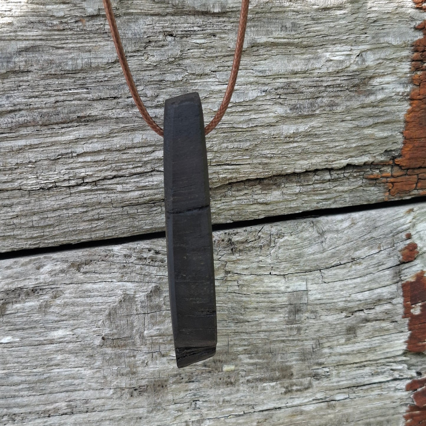 Portach  - Various Irish bog oak pendants with cord necklace