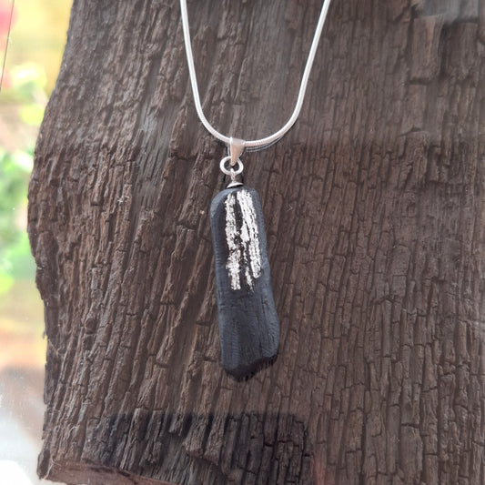 Pendant made out of irish bog oak finished with gold or silver leaf and necklace