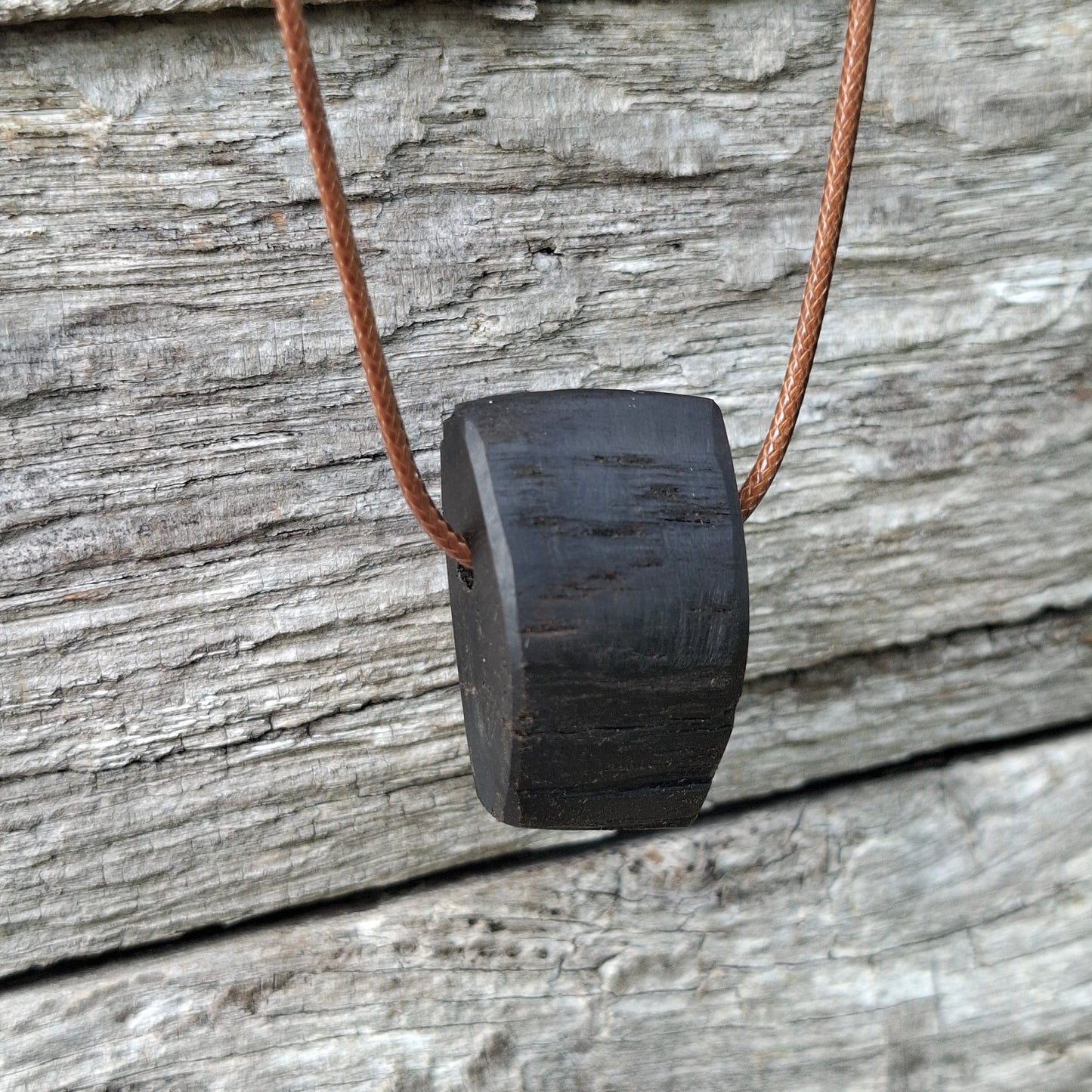 Portach  - Various Irish bog oak pendants with cord necklace