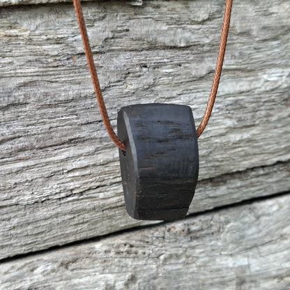 Portach  - Various Irish bog oak pendants with cord necklace