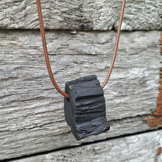 Portach  - Various Irish bog oak pendants with cord necklace