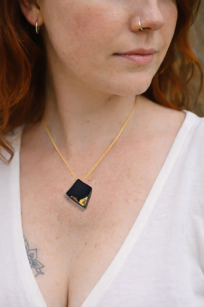 Scáil Óir - Irish bog oak pendant with 23.75kt gold leaf